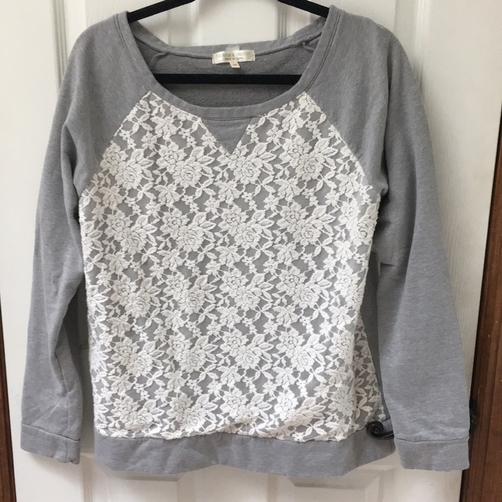 Lace front grey sweatshirt.